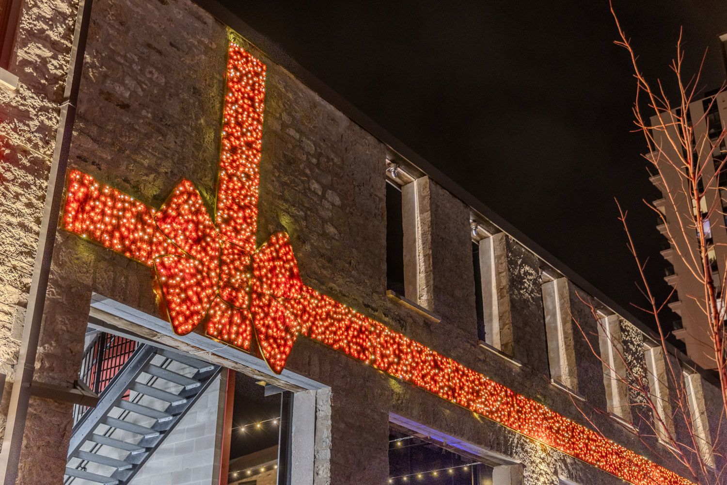 Close detail of the completed illuminated ribbon installation